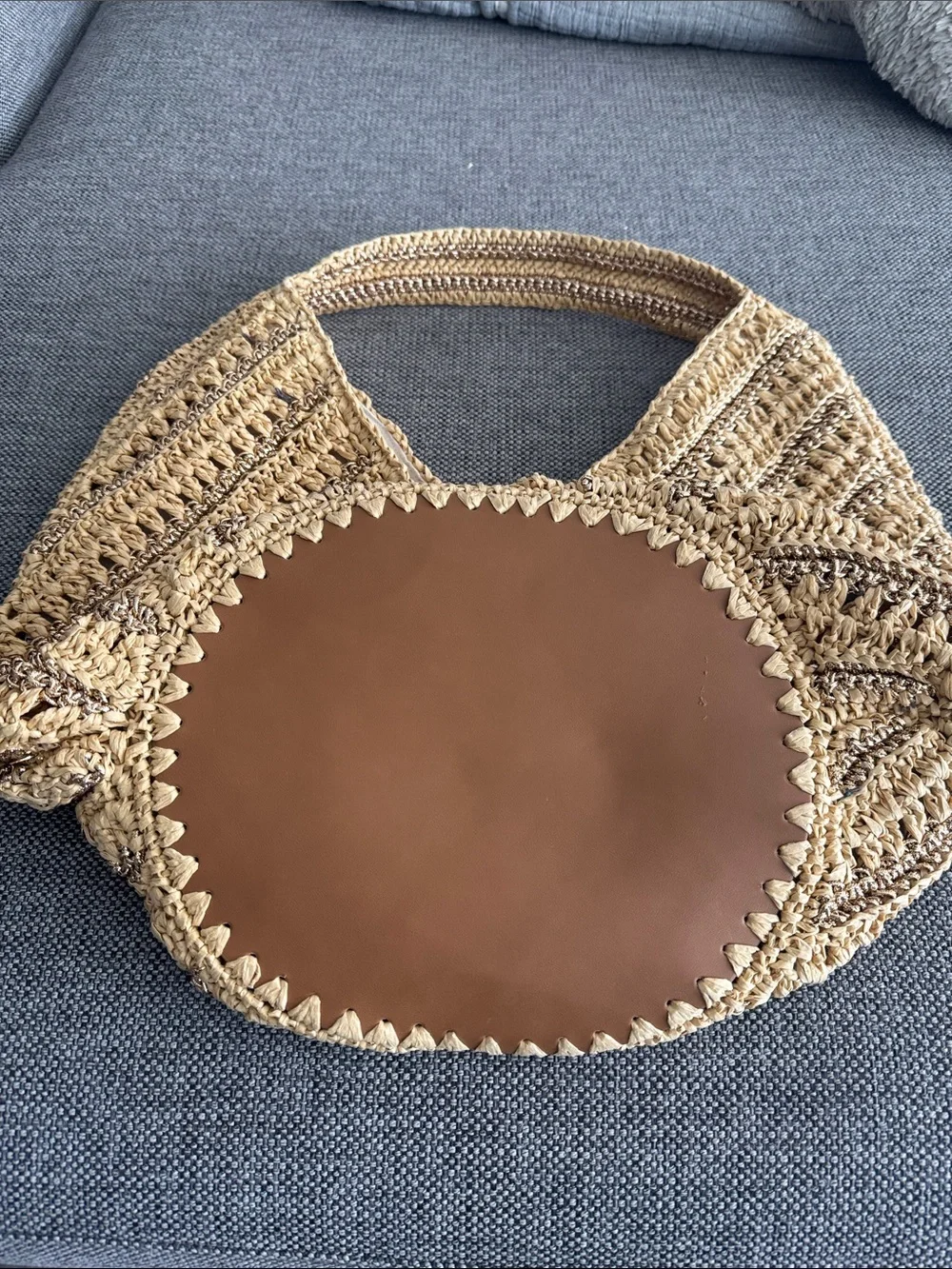 Roomy Raffia tote with lined interior.
